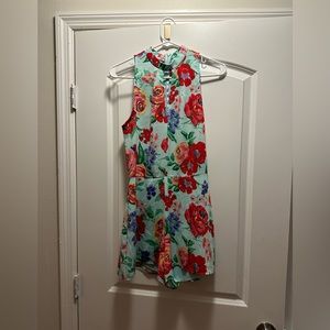 Adorable floral print romper. Size small high neck from local boutique